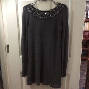 Sweater dress with sheer sleeves and jeweled neck
